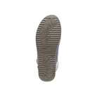 The image shows the sole of the DANSKO Womens Merrin Blue mule, featuring a textured pattern with two ginkgo leaf designs and horizontal grooves. The light brown sole is photographed from below against a white background.