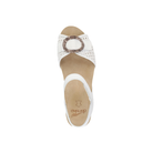 Dansko Women's Stella White sandal by DANSKO with beige sole and large round buckle, top view.