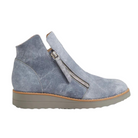 The Django & Juliette Womens Ohmy Denim bootie by DJANGO & JULIETT features gray suede, a side zipper, tan sole, and low wedge heel—shown from the side on a white background and designed to help minimize foot pain.