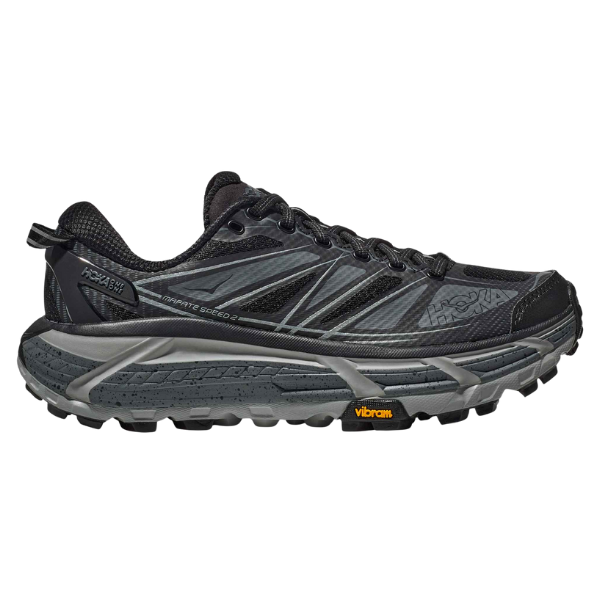 Black and gray running shoe on a white background