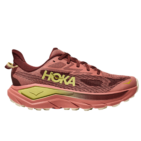 Pink and yellow running shoe with Hoka branding on a white background