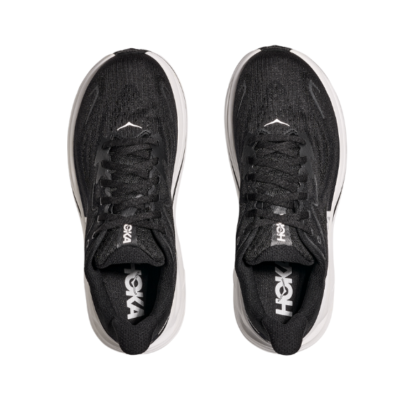 Top view of HOKA Mens Clifton 10 Wide Black/White running shoes side by side on a white background—ideal for those who love cushioned footwear.