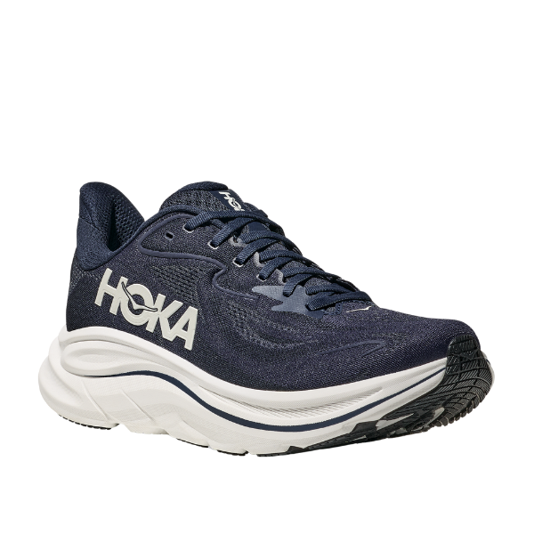The HOKA Mens Clifton 10 Wide Navy running shoe features white accents, a plush cushioned sole, and black tread, shown from an angled side and front view.