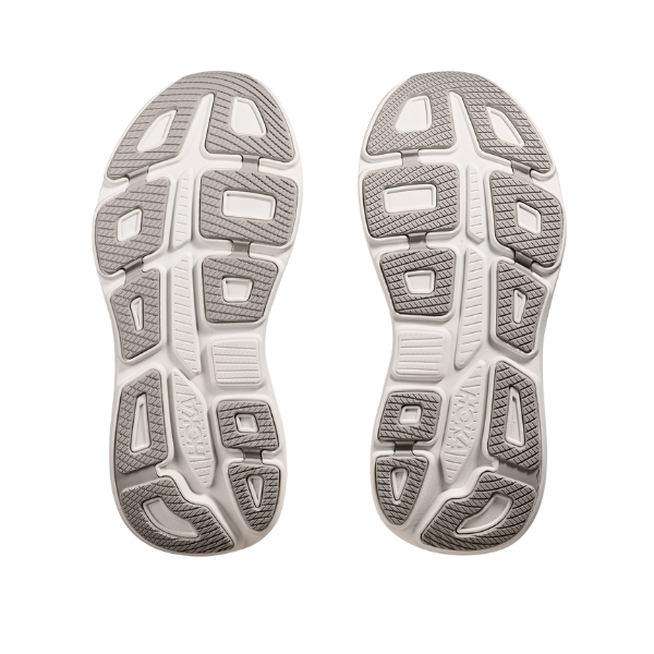 A pair of HOKA Womens Bondi 9 Wide Grey running shoe soles, mostly white with gray textured treads, are shown side by side on a white background. Designed for comfort and relief from plantar fasciitis.