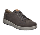The Josef Seibel Mens David 03 Granite is a gray leather sneaker with a thick light gray sole, metal eyelets, visible stitching, and a tan tongue logo tag, offering comfort and foot pain relief. Shown on a white background.