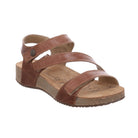 The Josef Seibel Womens Tonga Camel sandals feature brown leather, adjustable foot straps, a button-detailed ankle strap, tan cushioned footbed, and flat textured sole—designed for all-day comfort and support.