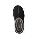 The UGG Women's Tazz II Black slipper features soft gray sheepskin lining and decorative stitching, shown from above against a white background.