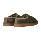 The UGG Men's Tasman Baxter Burnt Olive slip-on features a suede upper, brown rubber soles, and patterned trim at the opening. Shown from a rear diagonal angle on a white background; inspired by the classic UGG Tasman style.