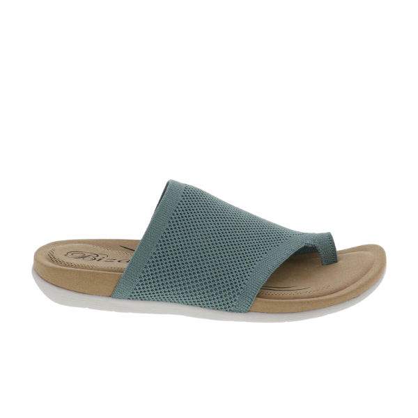 The BIZA FOOTWEAR Biza Womens Lavish Sage is a single teal sandal with a stretch knit mesh upper, open toe, tan comfort footbed, and white rubber sole.