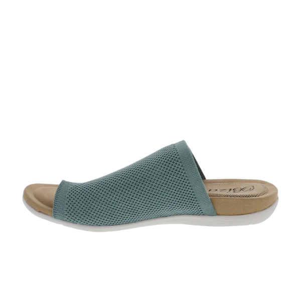 A side view of the BIZA FOOTWEAR Biza Womens Lavish Sage sandal features a teal stretch knit mesh upper, open toe, tan comfort footbed, and white sole.