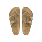 Pair of beige Birkenstock sandals on a white background