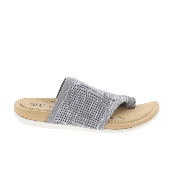 The Biza Womens Lavish Stone by BIZA FOOTWEAR is a gray stretch knit sandal with a textured upper, open toe, Wide strap, cushioned beige footbed, and white rubber sole—perfect for all-day travel comfort.