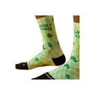 A person wears FEETURES Elite Light Cushion Mini Crew - Lucky Vibes, featuring targeted compression for comfort.