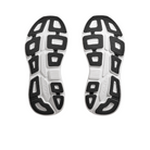 The HOKA Womens Bondi 9 Black/White features black and white soles with ultra-cushioned black textured patterns, white grooves, and geometric-shaped cutouts for traction and foot pain relief.