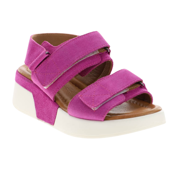 The Sovella Womens Maya Pink sandal by SOVELLA features two Wide velcro straps, a thick white sole, cushioned insole, and open toe and heel design.