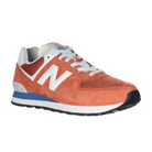 The NEW BALANCE Unisexs 574 Infield Clay/Sea Salt features bold orange with white and blue accents, a white N logo, grey laces, and a black sole—offering stylish comfort that helps reduce foot pain.