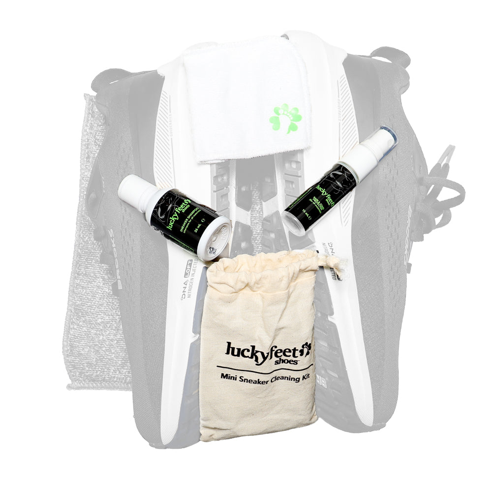 Luckyfeet Mini Sneaker Cleaning Kit with cleaning bottles and cloths on a white background