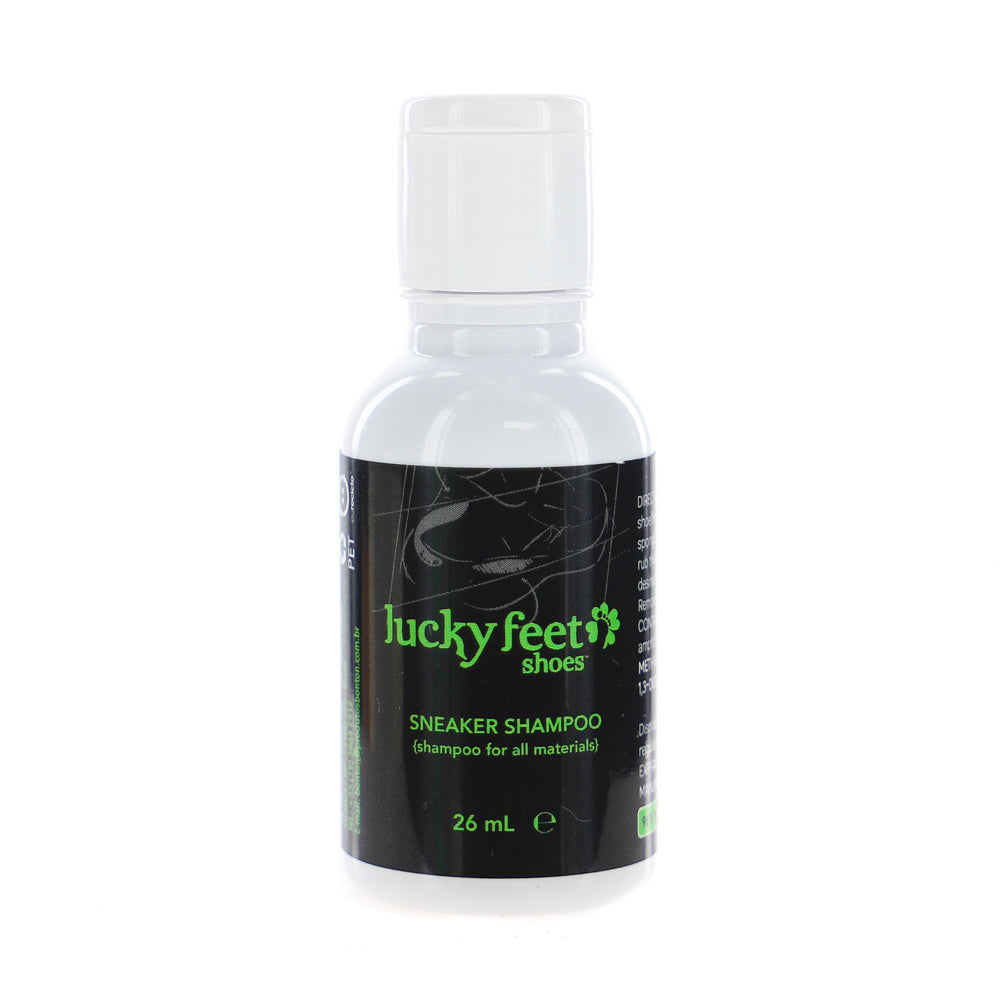 A 26 mL LUCKY FEET SHOE Mini Care Kit, a travel essential with a black and green label.
