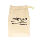 LUCKY FEET SHOE Mini Care Kit—beige drawstring bag, perfect for shoe care on the go.