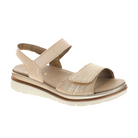 The FIDELIO Womens Trinity Cream sandal features two adjustable Velcro straps, a cushioned sole for foot pain relief, and a slightly raised white and brown outsole with an open-toe design.