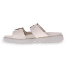 Side view of the REVERE Revere Womens Mermaid Ivory sandal in white premium leather, featuring two Wide straps with gold buckles and a thick ridged sole for minimalist style and comfort.