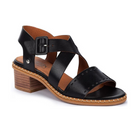 The Pikolinos Womens Blanes Heeled Sandals in black feature cross-over punched leather straps, a side buckle, visible sole stitching, and a low stacked wooden heel for style and comfort that helps reduce foot pain during all-day wear.
