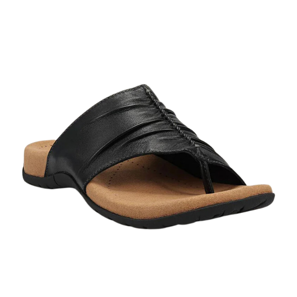 The TAOS Womens Gift 2 Sandal in black features a single Wide strap, tan cushioned footbed, and black rubber sole, offering comfort, arch support, and casual style.