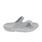 The Sovella Womens PF Slide Light Grey is a light gray slip-on sandal with three straps, a textured footbed, arch support, and a contoured, slightly elevated sole. SOVELLA is embossed on the side.