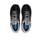 Top view of New Balance Womens 574 Core Black/White sneakers with white laces, gray accents, and blue insoles by NEW BALANCE, side by side on a white background.