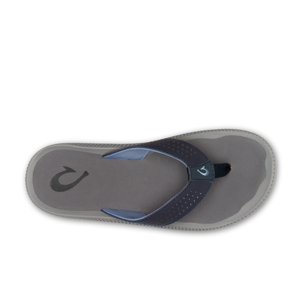 A single OLUKAI Mens Ulele Dark Blue water-resistant sandal with a black and blue strap, seen from above. Features a dark gray logo near the heel and is designed for comfort and foot pain relief on a white background.