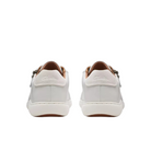 The CLARKS Womens Nalle Lace White sneakers feature white leather, Contour Cushion footbed for pain relief, white soles, light brown lining, and subtle branding on the heel tabs—all viewed from the back.