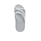 The Sovella Womens PF Slide Light Grey by SOVELLA features a textured, grid-patterned footbed with three crossing straps for superior arch support, shown in light grey against a plain white background.