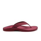 A side-profile of the OLUKAI Womens Ohana sandal in Red Earth/Bordeaux, featuring an anatomical footbed and a thick, curved strap, is displayed on a plain white background.