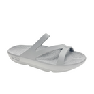 The Sovella Womens PF Slide Light Grey is a slip-on sandal with two angled straps, textured footbed, arch support, a slightly elevated sole, and SOVELLA branding on the side.