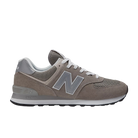 The NEW BALANCE Mens 574 Core Neutral features a gray suede and mesh upper, white laces and sole, plus a bold silver “N” logo—versatile footwear ideal for any men’s shoe collection.