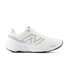 The New Balance Womens Fresh Foam 860v14 White features silver accents, a mesh upper, and a cushioned Fresh Foam X sole for comfort—ideal for stability seekers. Displayed in profile on a plain white background.