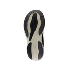 The image shows the sole of the New Balance Womens Fresh Foam X 1080v14 Black/White running shoe, displaying a wavy black and beige rubber tread with textured grooves for traction, set against a white background.