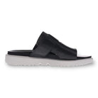 The Revere Women’s Biscay Black sandal by REVERE features Wide crisscross leather straps and a thick, flat white sole with a jagged tread for stylish traction and all-day comfort.