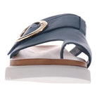 A close-up front view of the REVERE Revere Womens Biscay Blue sandal in premium blue leather with a gold buckle, brown insole, anatomical footbed, and thick white sole.