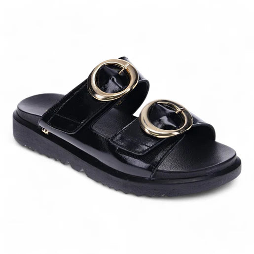 The REVERE Revere Womens Mermaid Black is a black adjustable slide sandal with two Wide straps, large gold buckles, premium leather construction, and a thick, textured sole.
