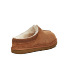 A chestnut UGG Mens Neuman Slipper with cozy UGGpure wool lining, visible stitching, and a textured Treadlite by UGG rubber sole, shown from the back side angle.