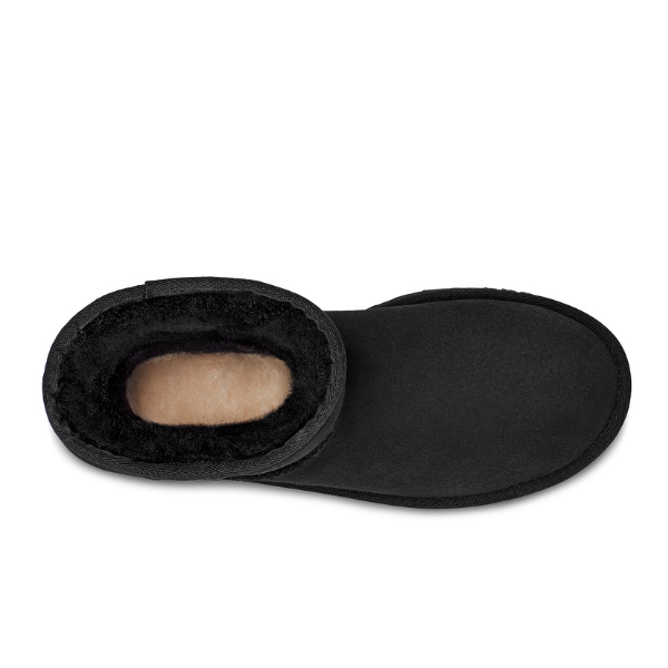 Top view of the UGG Womens Classic Short II Boot Black, featuring a rounded toe and plush light brown fleece lining for cozy foot comfort.