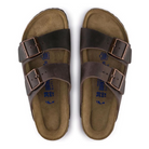 A pair of BIRKENSTOCK Womens Arizona Soft Footbed Oiled Leather Habana sandals with two adjustable buckle straps, shown side by side to display their soft footbeds and soles.