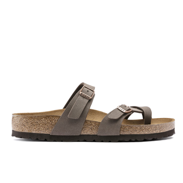The BIRKENSTOCK Womens Mayari Birkibuc Mocha sandal, featuring two adjustable straps, a cork footbed, and a black textured sole, is shown in side profile on a white background.