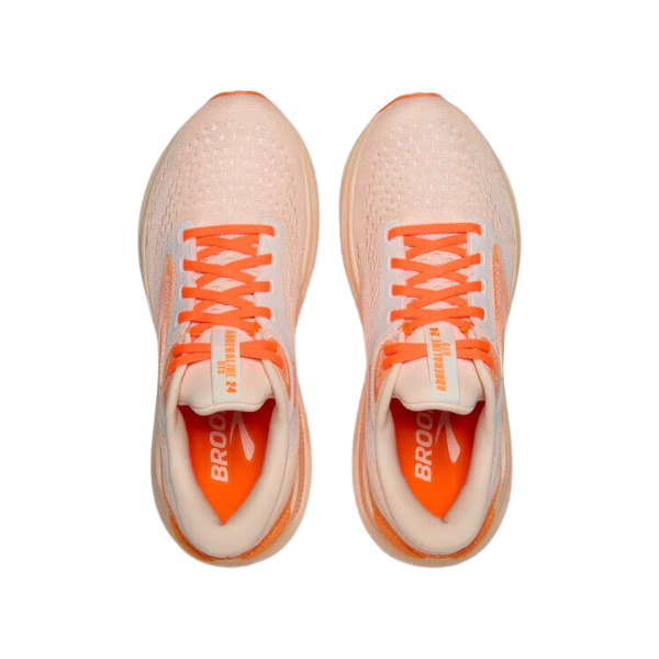A pair of Brooks Womens Adrenaline GTS 24 Pink running shoes by BROOKS, seen from above on a white background, features orange laces and accents, white branding on the insoles and tongue, plus GuideRails® support for stability.