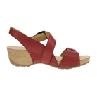 The DANSKO Womens Trinity Cayenne Burnished is a red open-toe sandal with a low wedge heel, tan sole, crisscross leather straps, white stitching, and slingback strap, designed for arch support and comfort.