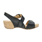 The Dansko Womens Trinity Black Burnished Nubuck by DANSKO is a black open-toe wedge sandal with a slingback, two Wide nubuck straps, visible stitching, contoured footbed for arch support, and a textured beige sole.