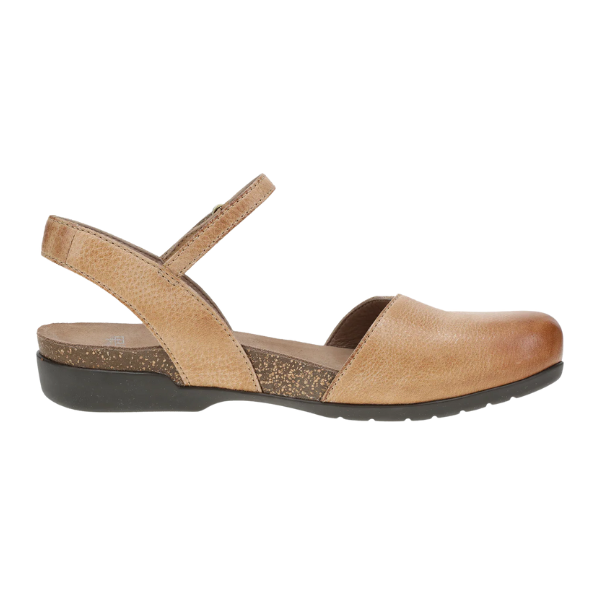 The Dansko Womens Rowan Honey Distressed by DANSKO is a tan leather Mary Jane sandal with a closed toe, open heel, adjustable ankle strap, and low black rubber sole—ideal for everyday comfort.