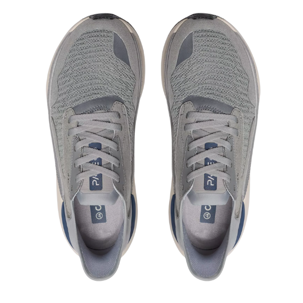 Pair of gray sneakers with blue accents on a white background