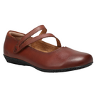 The TAOS Women's Banter Cognac is a brown leather Mary Jane flat with two diagonal straps, a rounded toe, and a textured black sole—designed for excellent arch support and comfort, perfect for those with plantar fasciitis.